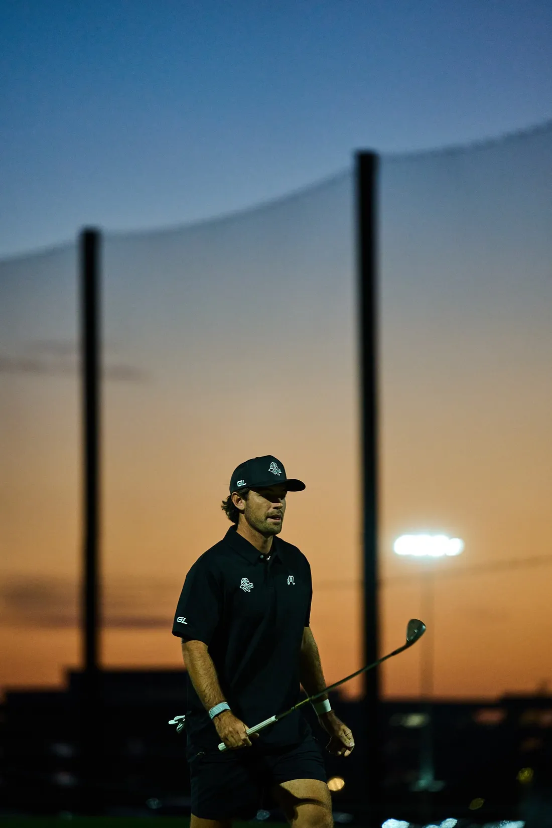 Grass League player at dusk